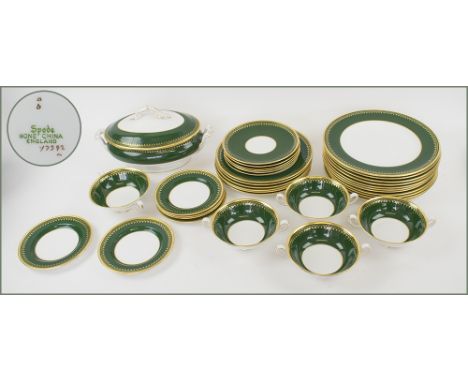 SPODE PART DINNER SERVICE, early 20th century retailed by Thomas Goode, green and gilt, including eleven dinner plates. (35) 