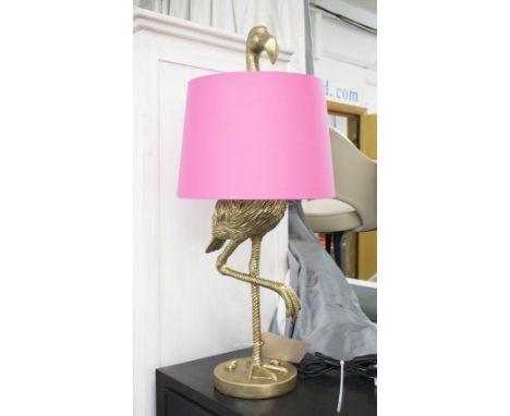 FLAMINGO TABLE LAMP, with pink shade in gilded resin finish.81cm H