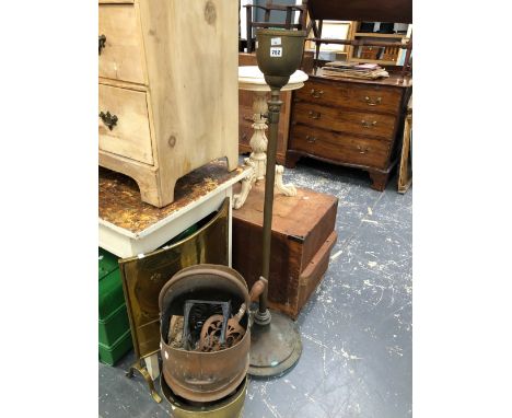 A COPPER AND A BRASS COAL SCUTTLE, A BRASS FIRE SCREEN, TWO TRIVETS AND A BRASS ADJUSTABLE COLUMN SUPPORT FOR AN OIL LAMP