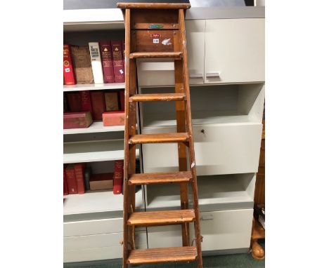 A VINTAGE STEP LADDER