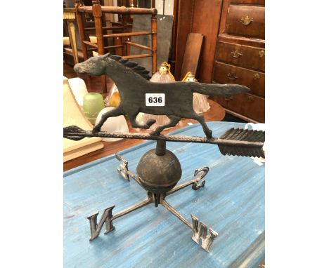 AN ALUMINIUM WIND VANE MODELLED AS A TROTTING HORSE