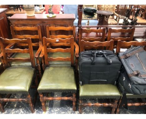 A SET OF EIGHT OAK LADDER BACK LEATHER SEAT DINING CHAIRS INCLUDES TWO CARVERS (8)