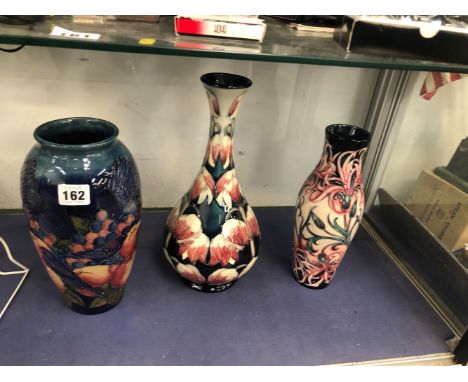THREE MOORCROFT VASES AND A TABLE LAMP