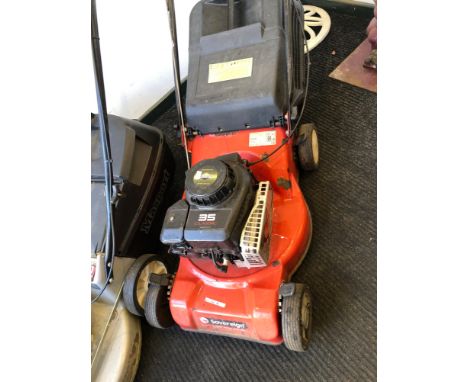 A SOVEREIGN LAWN MOWER WITH BRIGGS AND STRATTON ENGINE
