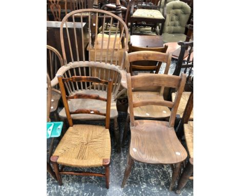 AN ANTIQUE RUSTIC WINDSOR COMB BACK ARMCHAIR TOGETHER WITH TWO OXFORD TYPE CHAIRS AND A RUSH SEAT CHAIR (4)