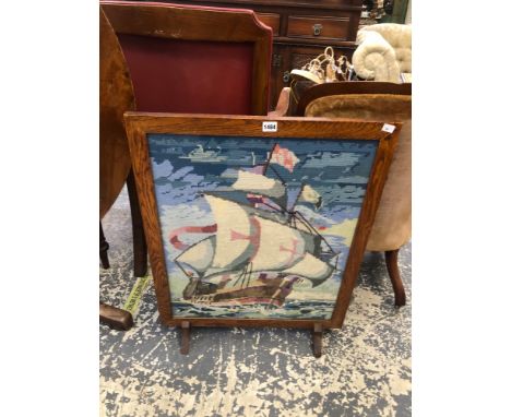 A VINTAGE OAK NEEDLEWORK FIRE SCREEN
