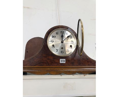 A MAHOGANY NAPOLEONS HAT SHAPED CLOCK CHIMING ON RODS