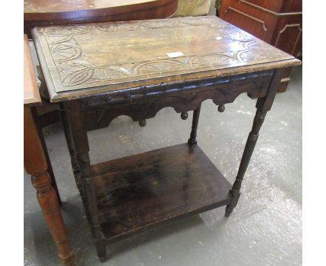 Heavily carved oak lamp or side table with under tier on turned legs. (B.P. 21% + VAT) width - 66cm Depth - 45cm Height - 73c