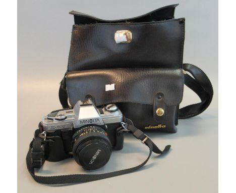 Minolta X-300 35mm SLR camera outfit, the camera with standard 50mm lens, together with additional wide angle 28mm lens, Cull