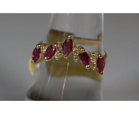 14ct gold ruby and diamond wishbone ring. Ring size M. Approx weight 2.3 grams. (B.P. 21% + VAT) Jewellery valuer not availab