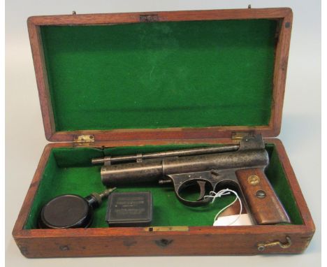 Webley & Scott Mark I air pistol with wooden grip, having brass inset, manual safety catch bearing serial no. 14022, containe