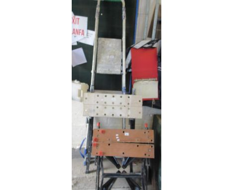 Two folding work benches, together with an aluminium ladder. (3)(B.P. 21% + VAT) 