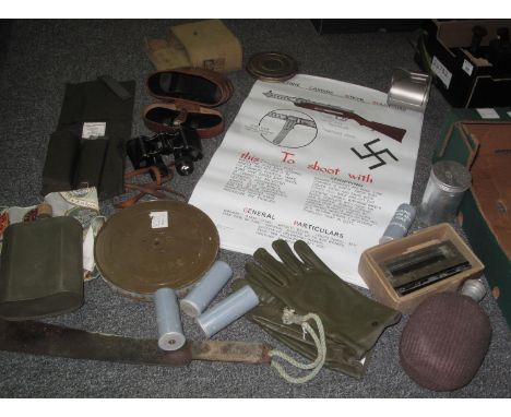 Box containing a collection of posters depicting various weapons, 50M of US Army razor wire, Army water bottles, empty 37mm s