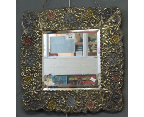 Repousse framed mirror with bevel plate. Overall 46 x 44cm approx. (B.P. 21% + VAT) 