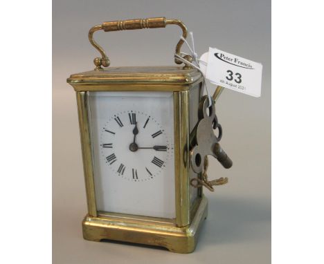 Small French brass carriage clock with full depth Roman enamel dial, with keys, case 114cm high approx. (B.P. 21% + VAT) Gene