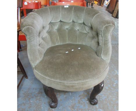 Early 20th Century upholstered button back tub chair on circular seat with carved oak scroll design front legs. (B.P. 21% + V