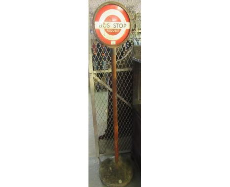 Vintage enamelled sign, 'Bus Stop request', on metal pedestal and composite base. (B.P. 21% + VAT) 