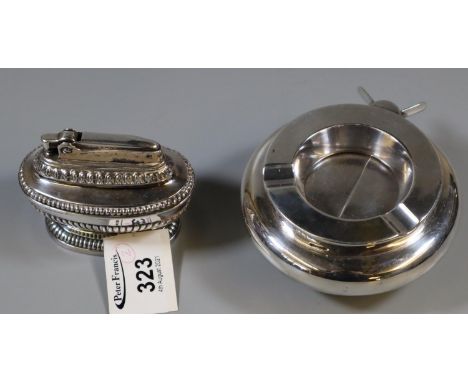 Vintage Ronson table lighter of fluted form, together with a novelty silver plate ash tray with cigar cutter. (2)(B.P. 21% + 