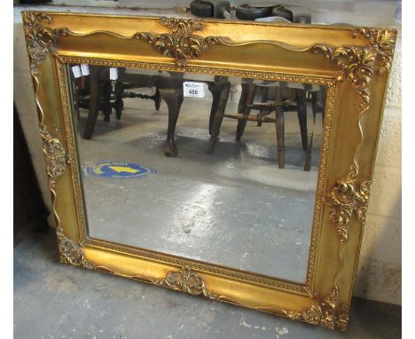 Modern bevel plate mirror with moulded foliate frame. (B.P. 21% + VAT) 