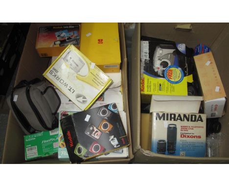 Two boxes of photographic equipment to include: two boxed Miranda lenses in good condition, a Canon Powershot A300 digital ca