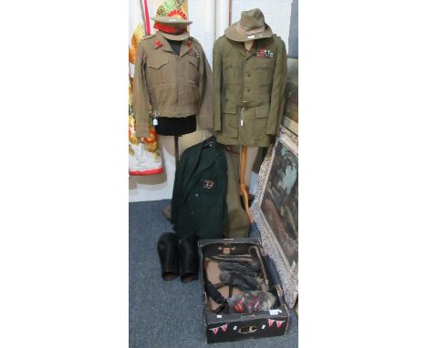 British Army staff officers uniform to include; cap, jungle hat, short blouson, long jacket, two pairs of trousers. Bearing t