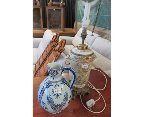 Japanese porcelain table lamp decorated with enamelled flowers and butterflies, with elephant handles on a gilded base. Toget