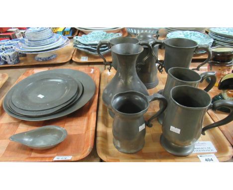 Two trays of probably 18th Century pewter items to include; pair of two handled trophy cups, tankards, chargers with London t