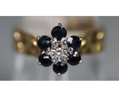 9ct gold sapphire and diamond ring.  Ring size M&amp;1/2. Approx weight 3.1 grams. (B.P. 21% + VAT) 