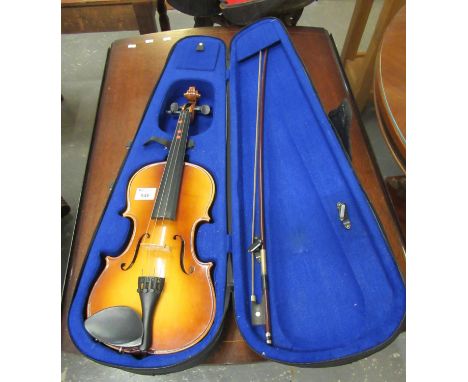 Modern students violin with bow in fitted case, indistinct label to the interior. (B.P. 21% + VAT) 