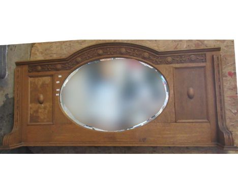 Early 20th Century carved oak bevel plate over mantel mirror.(B.P. 21% + VAT) 
