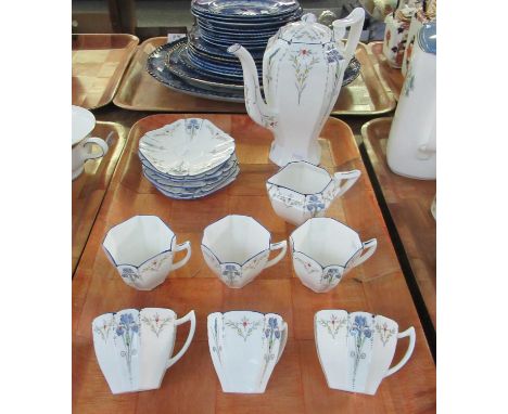14 piece Shelley bone china coffee set decorated on a white ground with hand painted enamelled flowers and foliage, registrat