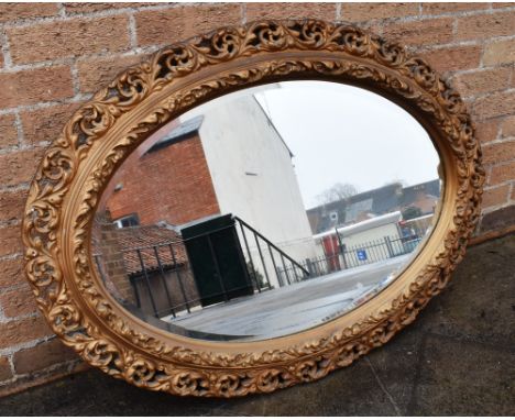 20TH CENTURY GILT GESSO MIRROR, with scroll decoration surround, h 82cm x w 113cm