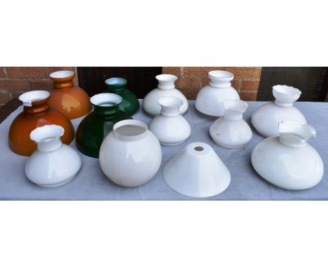 THIRTEEN VARIOUS OPAQUE GLASS OIL LAMP SHADES  including two amber cased and two green cased examples Condition Report : all 