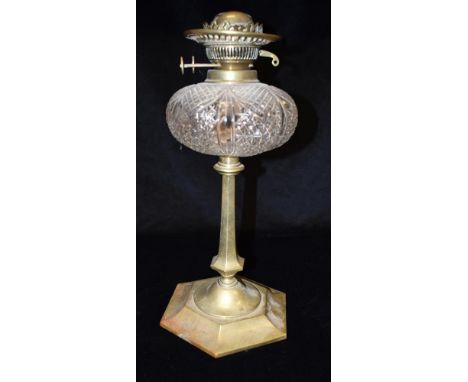 A LATE VICTORIAN/EDWARDIAN OIL LAMP BASE  with cut glass reservoir of lobed form, on brass column with hexagonal base, 41cm h