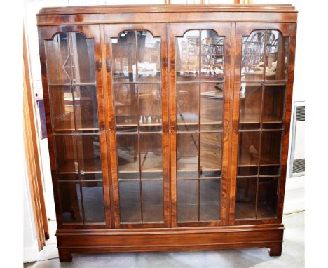 20TH CENTURY MAHOGANY DISPLAY CABINET, with central double door, flanked to each side by a single door, and each section with