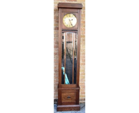 A CONTINENTAL OAK CASED LONGCASE CLOCK  the brass coloured dial with Arabic Art Nouveau style hour markers and hands, the twi