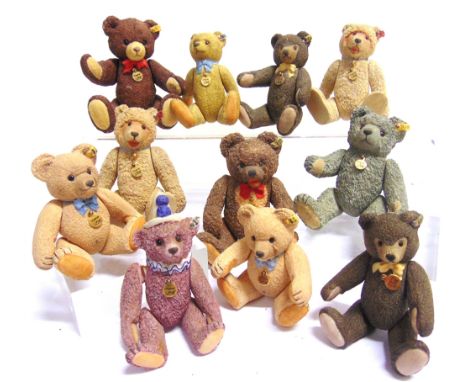 ELEVEN STEIFF CERAMIC AND CAST RESIN TEDDY BEARS  various sizes, the largest 12.5cm high. Condition Report : Some with minor 