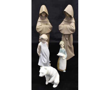 FIVE LLADRO FIGURES:  two modelled as monks 35cm high; another as a young girl with butterflies; a young girl holding a pigle