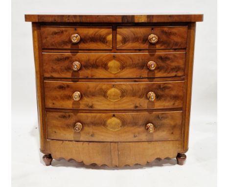 Victorian mahogany and flamed mahogany bow fronted chest of drawers, the two short and three long graduated drawers with turn