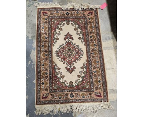 Turkish cream ground wool pile rug&nbsp;with central floral medallion and floral spandrels, with multiple floral borders, 132