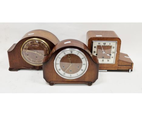 1930's Art Deco walnut and cross-banded mantel clock of stepped square form with Arabic numerals and three winding holes, 24c