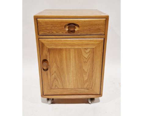 Ercol light elm Windsor bedside cabinet&nbsp;with a single drawer over a single cupboard door, on castors, 70cm high x 46cm w
