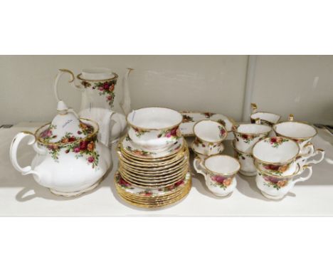 Royal Albert bone china 'Old Country Roses' pattern part tea and coffee service, printed with clusters of pink and yellow ros