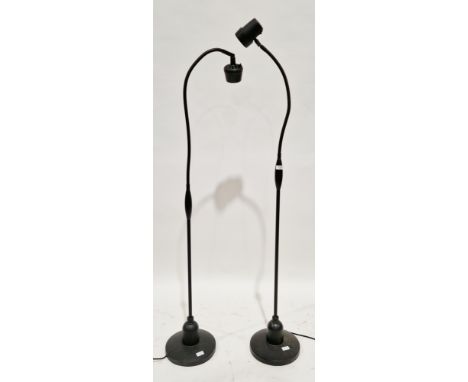 ' Ask Serious&nbsp; Readers' black floor lamp or light with swan neck column together with another similar floor lamp retaile