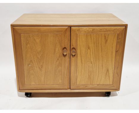 Ercol light elm Windsor media cabinet, the two doors opening to two pull-out shelves, 79cm high x 104cm wide x 56cm deep&nbsp