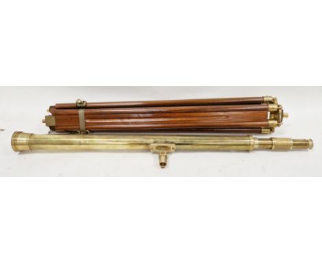 Reproduction brass telescope on a mahogany and brass tripod folding stand, telescope 96.5cm long
