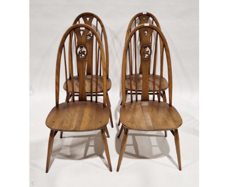 Set of four Ercol Windsor Range hoop and spindle back elm seated dining chairs with swan motifs, 99cm high x 45cm wide x 46cm