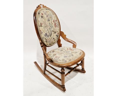 Victorian beech and hardwood rocking chair&nbsp;with oval back, shaped cresting, floral tapestry padded back and seat and tur