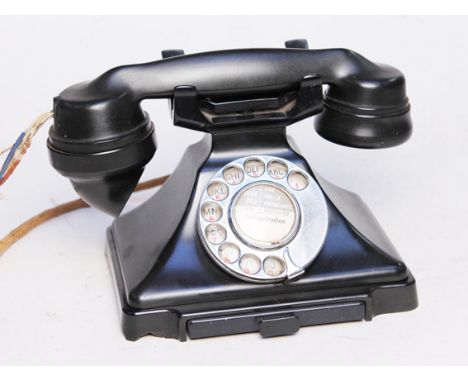 A black bakelite vintage telephone