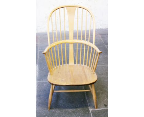 An Ercol light elm and beech Windsor chair. H102cm